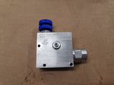 3-way flow control valve with integrated pressure relief valve