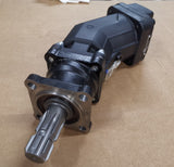Inclined axis axial piston pump with front bearing